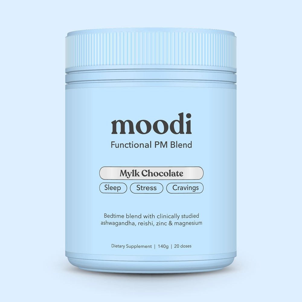 Blue container of 'moodi' Functional PM Blend on a light blue background