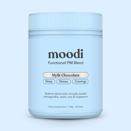 Blue container of 'moodi' Functional PM Blend on a light blue background