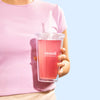 Blends with Benefits Tumbler - Moodi - Accessories - Person holding tumbler with Pink Lemonade drink