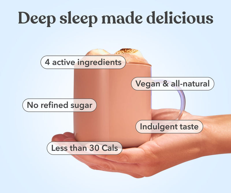 Hand holding a pink mug with health benefits text on a light blue background