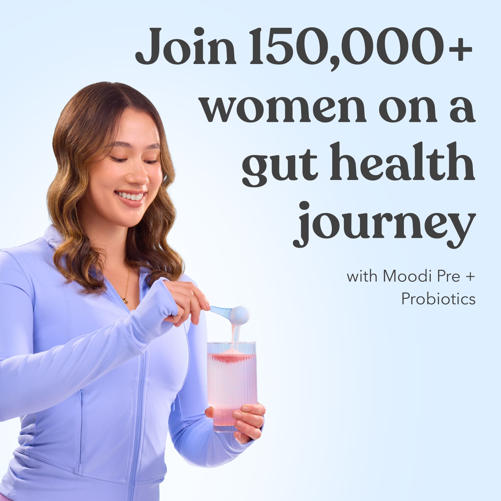 Woman pouring a scoop of Moodi Pink Lemonade powder into a glass with text promoting a gut health journey with Moodi Pre + Probiotics.