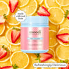 Moodi Pink Lemonade tub on a background of lemons and strawberries