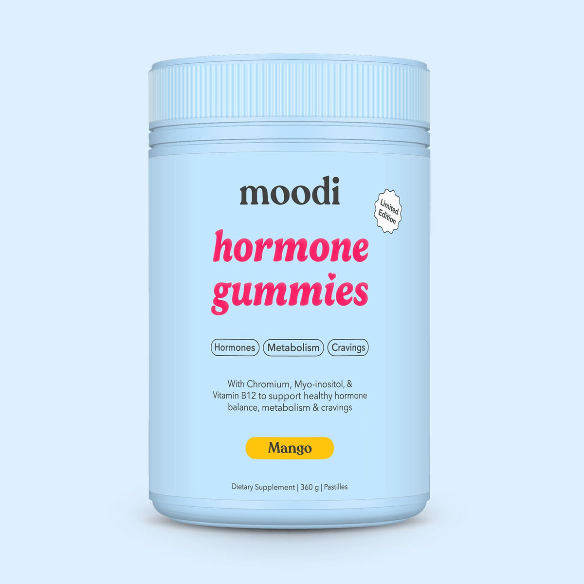 A tub of Moodi Mango Hormone Gummies against a light blue background.