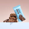 Moodi Double Choc protein crisp bar on a beige background