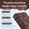 Double choc protein crisp bar with text highlighting its ingredients on a brown and blue background.