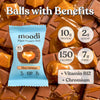 Moodi Choc Caramel plant protein ball packaging with nutritional information on a chocolate and caramel background