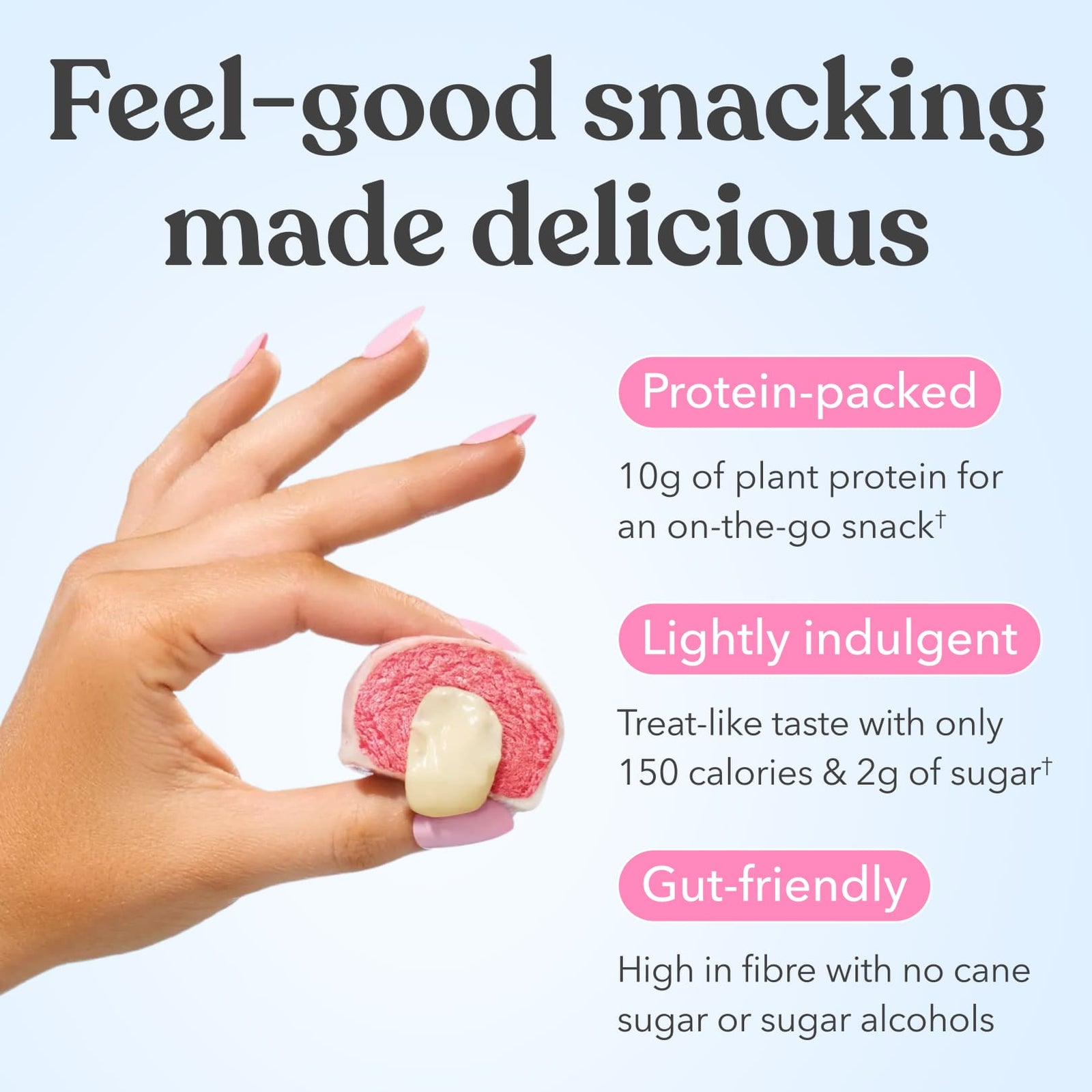 Hand holding Moodi Raspberry White Choc plant protein ball with text about its nutritional benefits on a light blue background