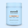 Blue container of 'moodi' Functional AM Blend Gingerbread on a light blue background