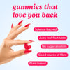 Hand holding a red gummy with text about health benefits on a light blue background