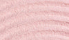 Close up shot of a light pink powder with patterns.