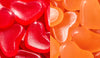 Red and orange heart-shaped gummies