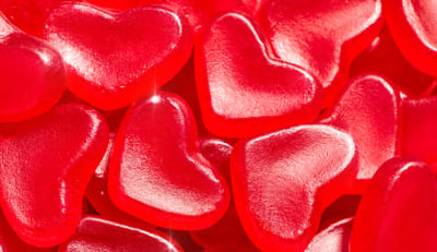 Close-up of red heart-shaped gummies